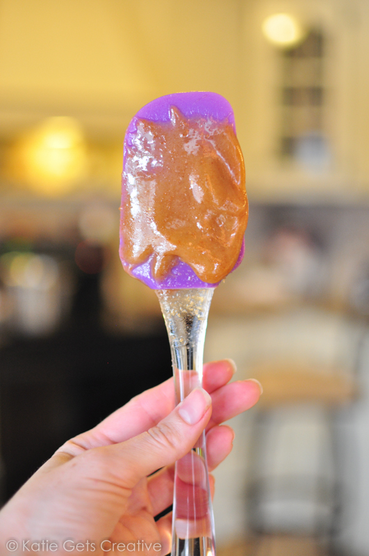 A spatula with cooked caramel mixture hardening 