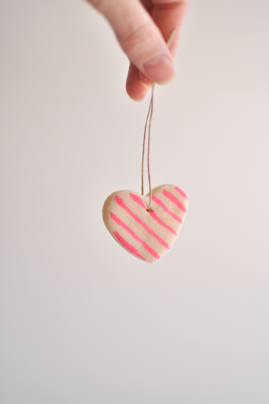 Heart shaped salt dough ornaments hung with twine 