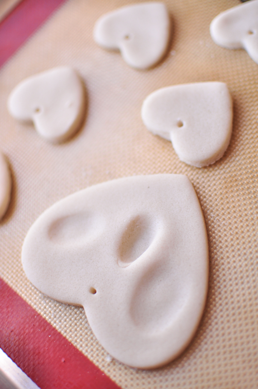 Salt dough ornaments on a silicone baking mat