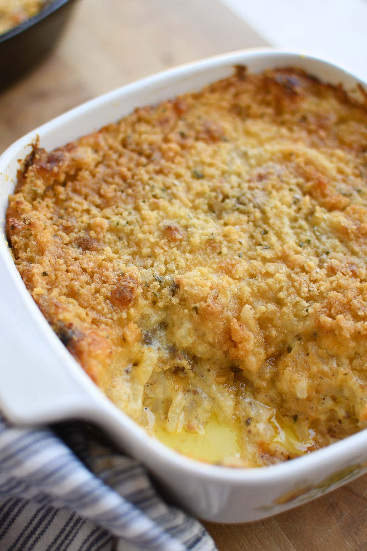 A small baking dish with hashbrown and ground beef casserole