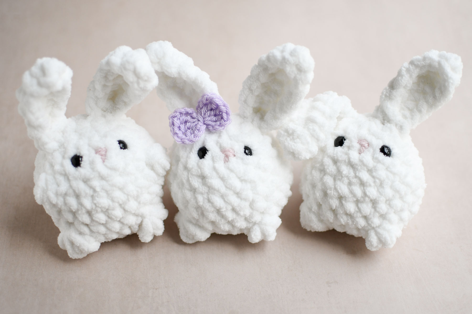 a trio of mini crochet bunnies