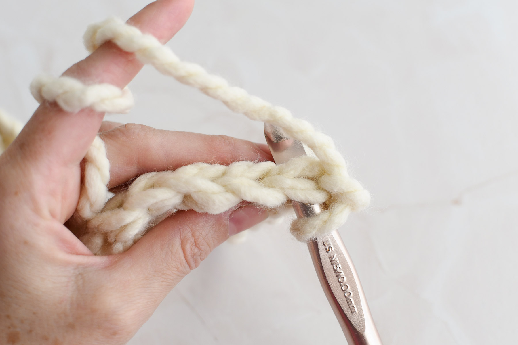 Working the first stitch of Round 2. 