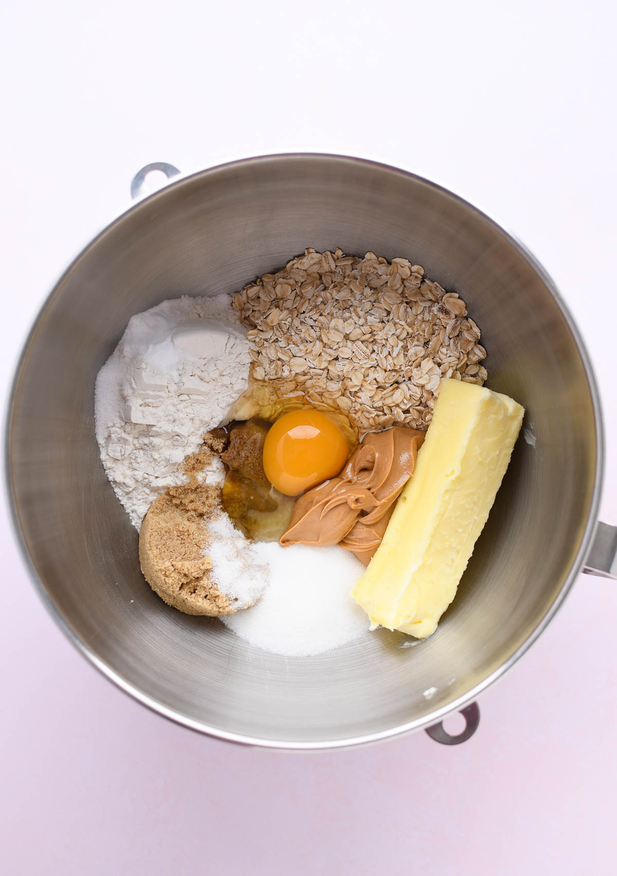 A mixing bowl with peanut butter fingers ingredients.